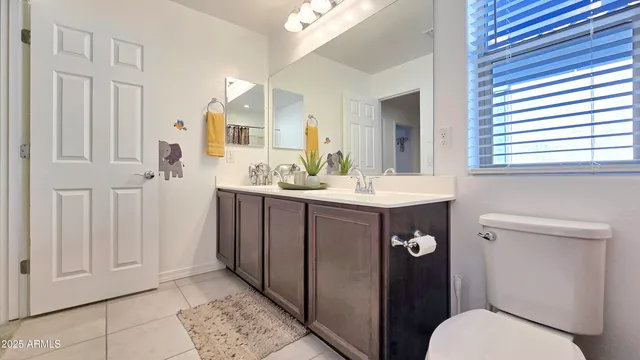 a view of a house with a street