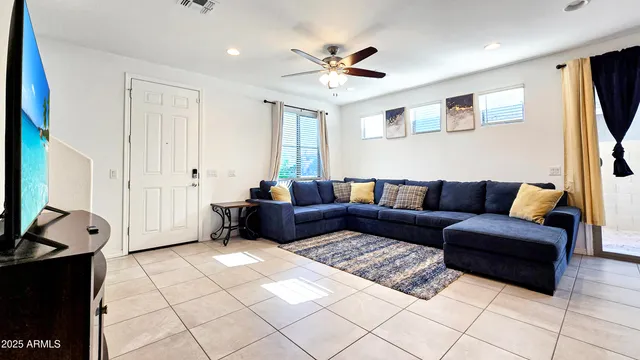 a kitchen with stainless steel appliances granite countertop a refrigerator and microwave