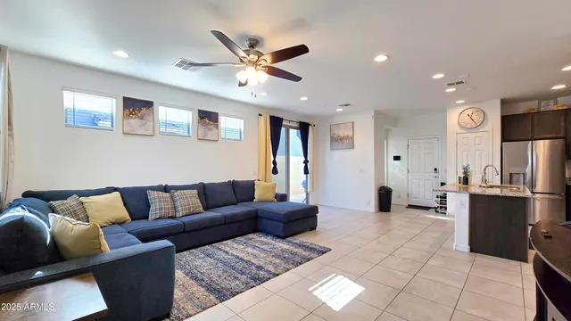 a kitchen with stainless steel appliances granite countertop a sink stove and microwave