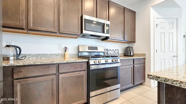 a bedroom with a bed and a cabinets