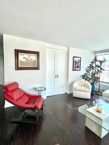 a living room with furniture and a couch