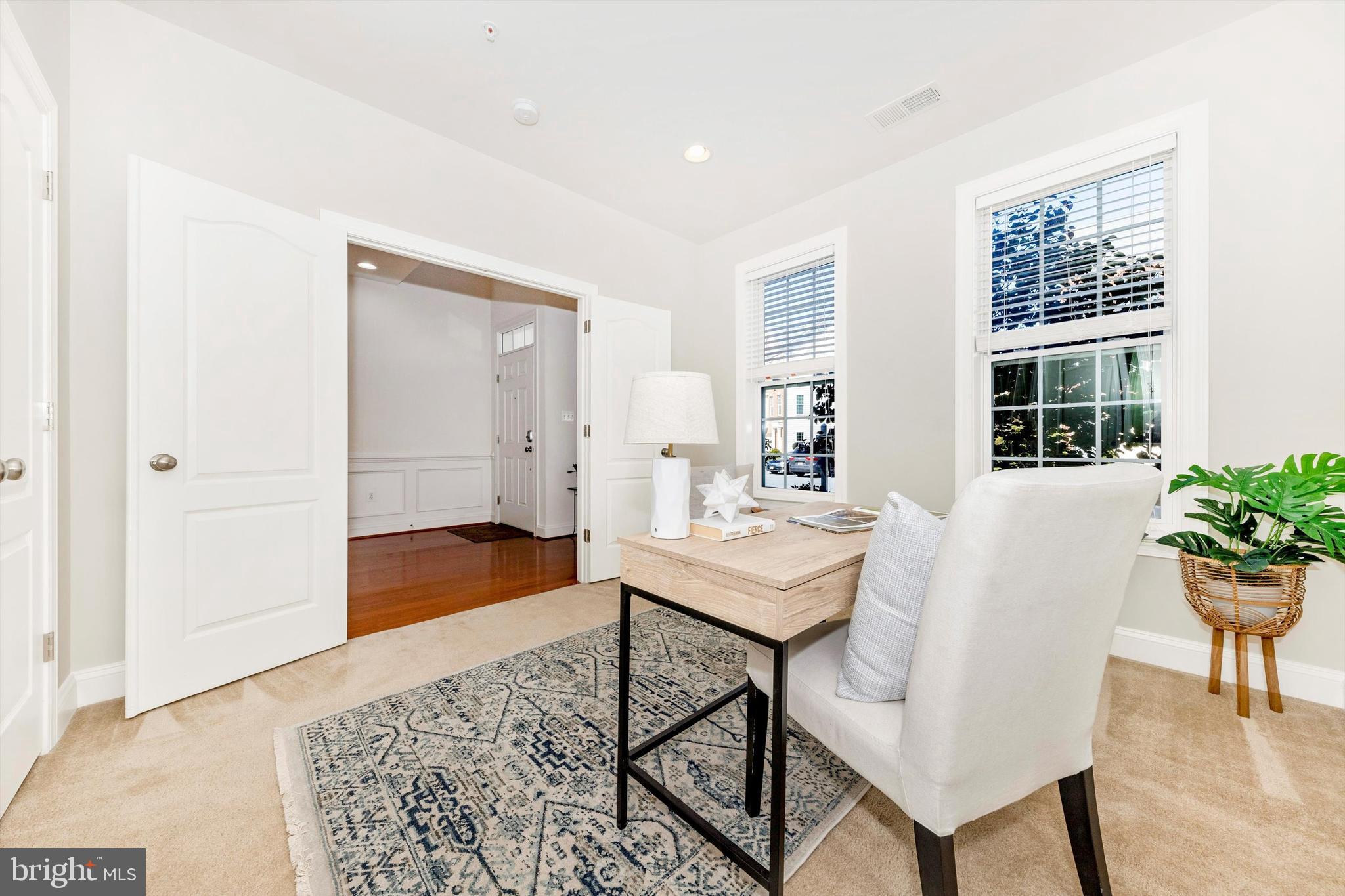 9655 Bothwell Lane Frederick, MD 21704 - Photo 11 of 58 a view of a livingroom with furniture and wooden floor