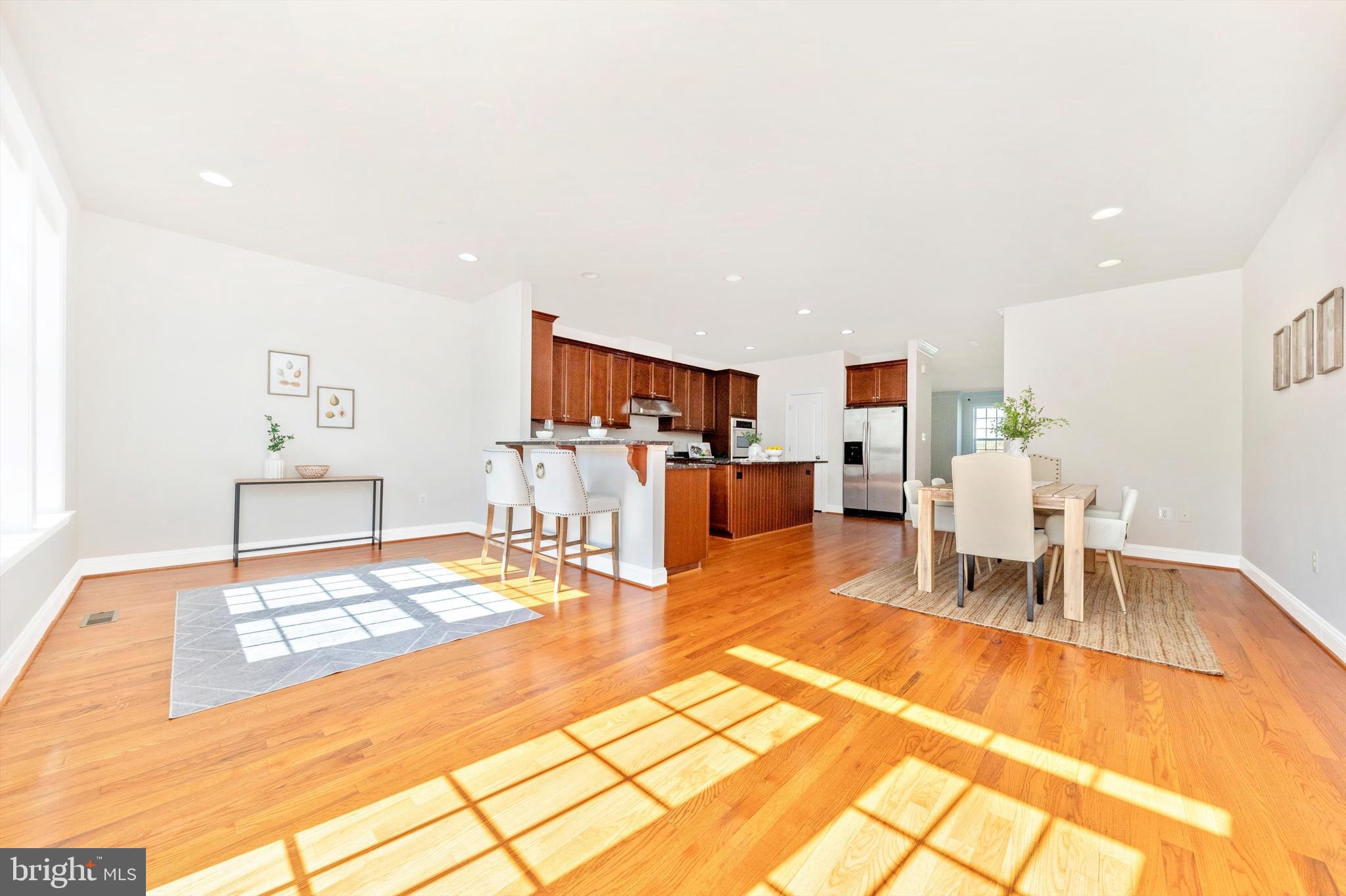 9655 Bothwell Lane Frederick, MD 21704 - Photo 27 of 58 a living room with furniture and a table