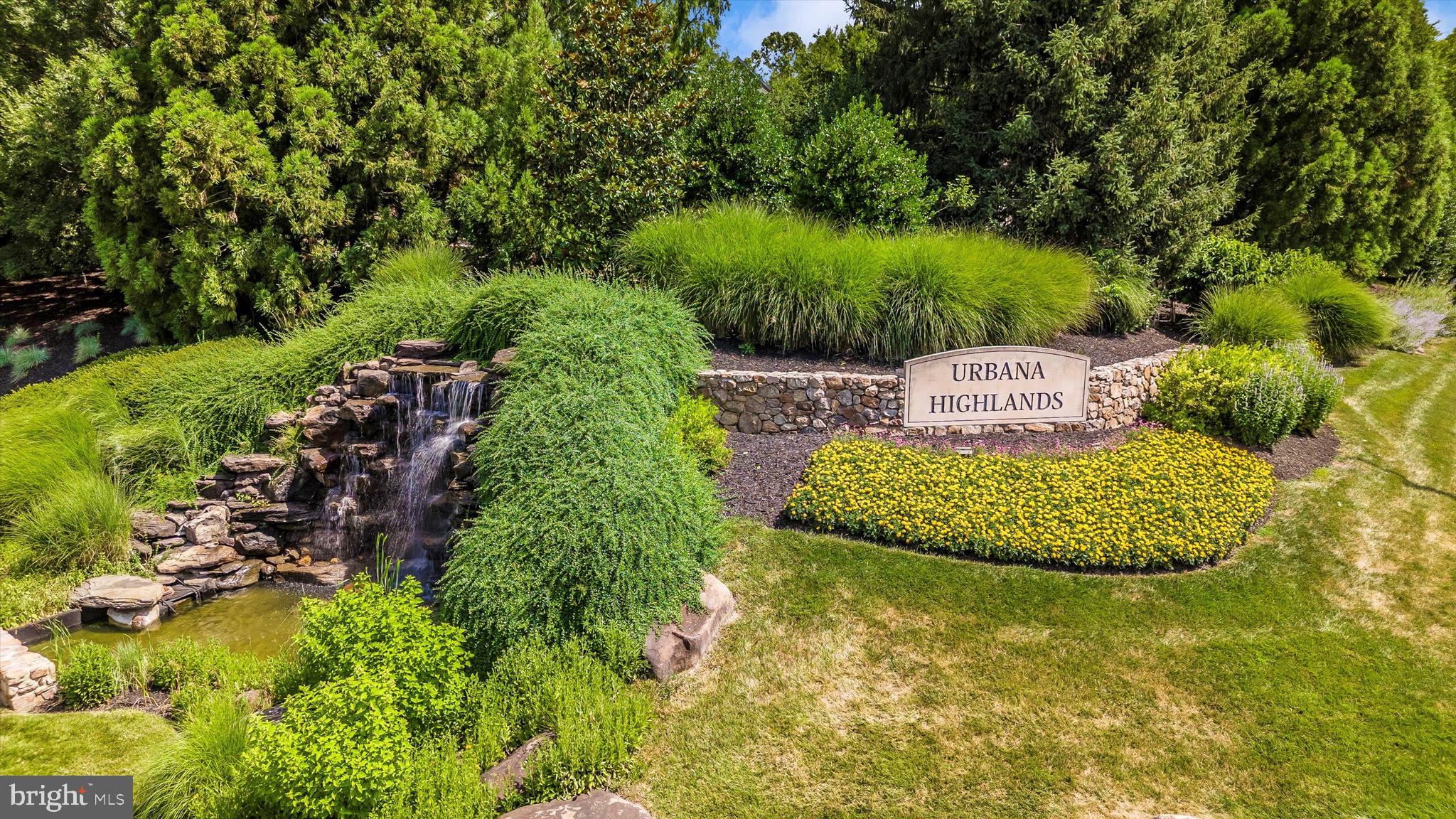 9655 Bothwell Lane Frederick, MD 21704 - Photo 3 of 58 a view of a garden with a fountain