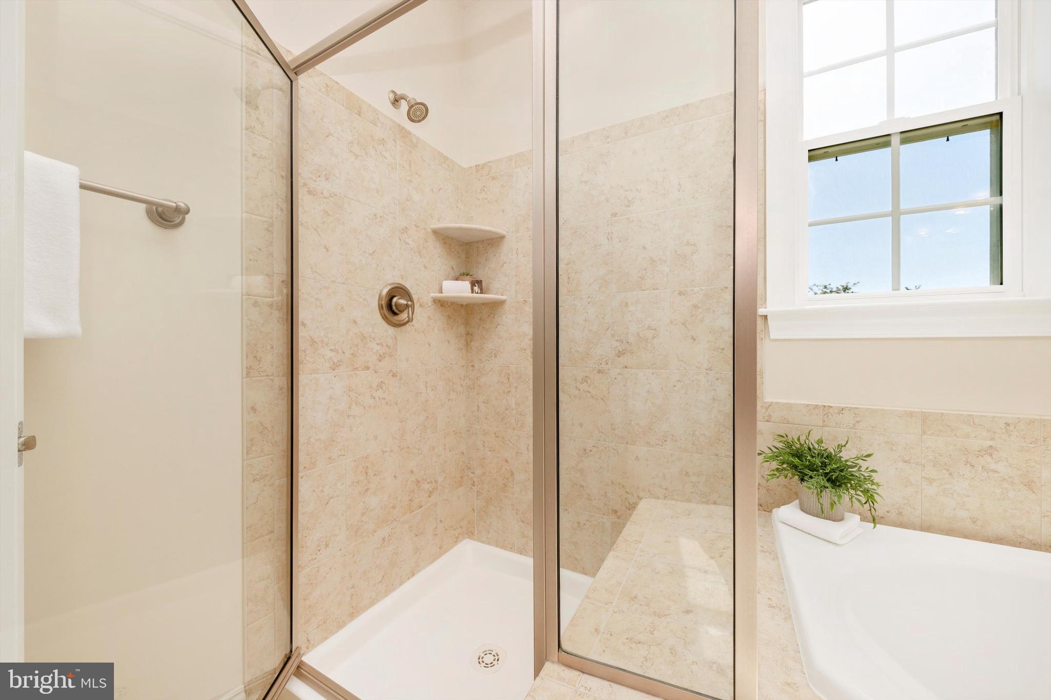 9655 Bothwell Lane Frederick, MD 21704 - Photo 33 of 58 a bathroom with a shower