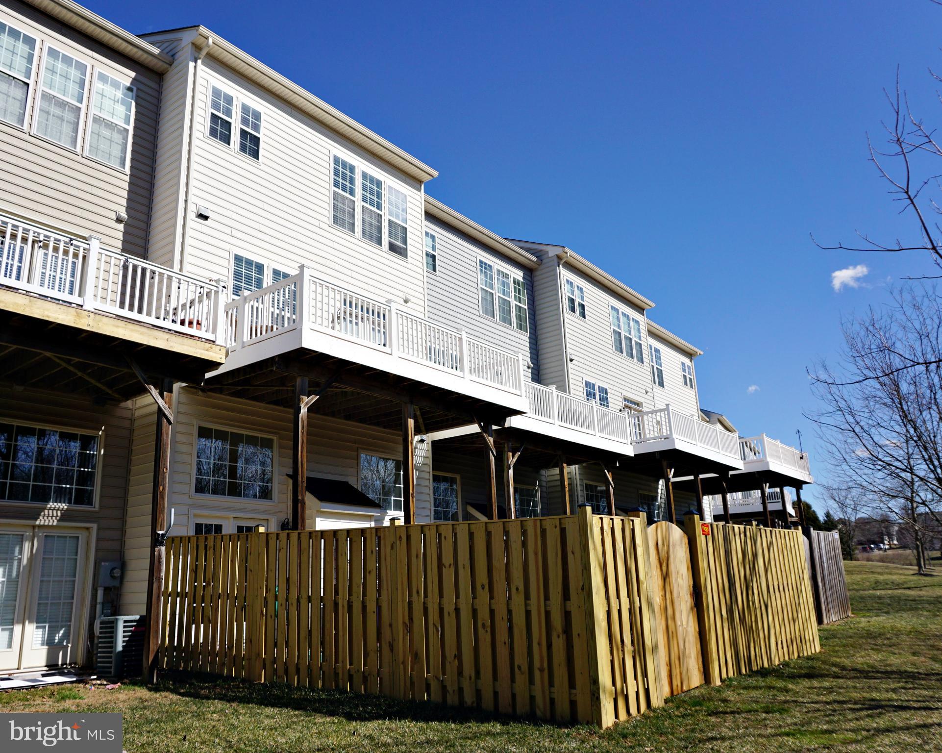 9655 Bothwell Lane Frederick, MD 21704 - Photo 35 of 58 a front view of a house with a balcony