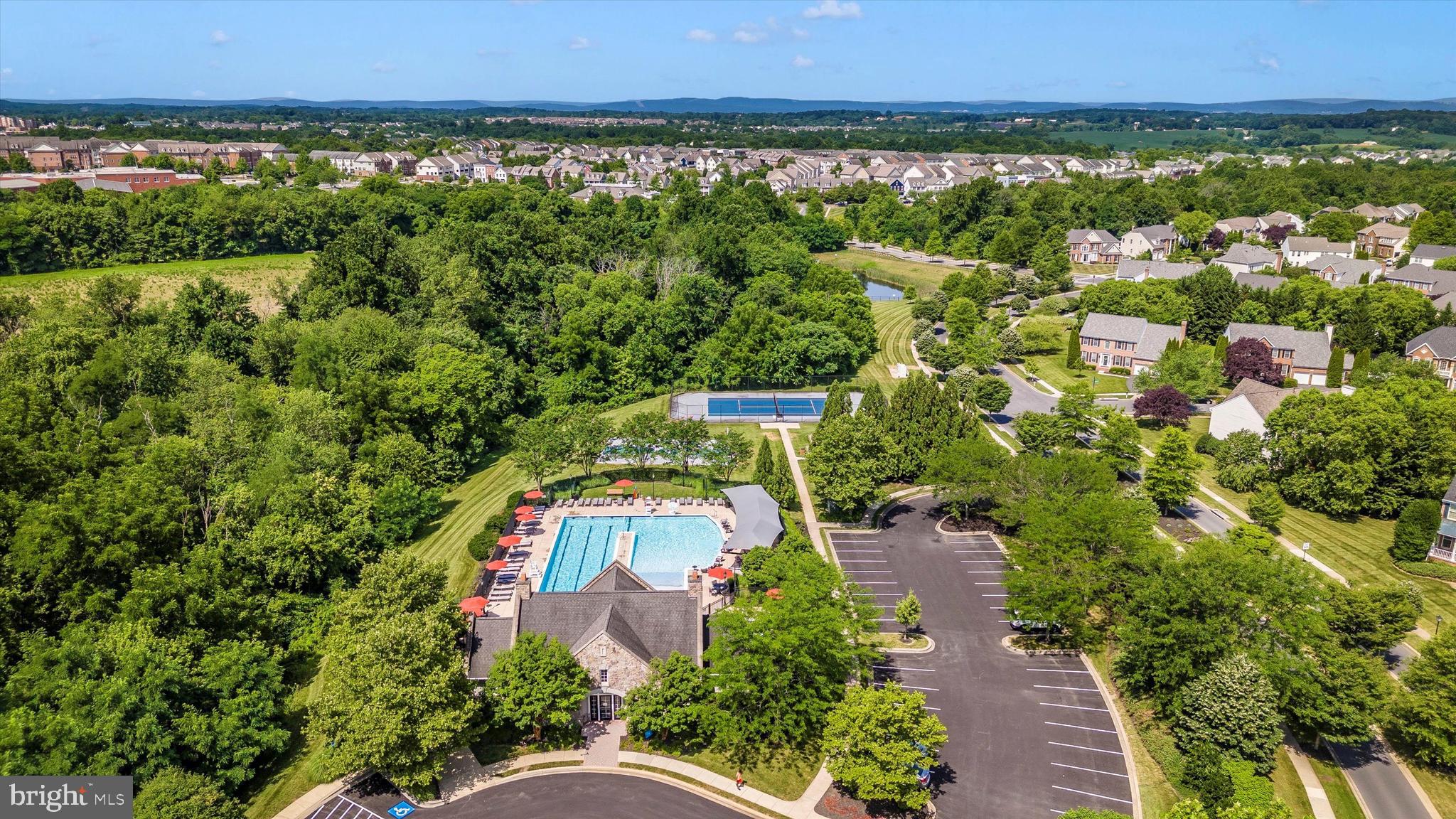 9655 Bothwell Lane Frederick, MD 21704 - Photo 50 of 58 an aerial view of a house with a yard and lake view
