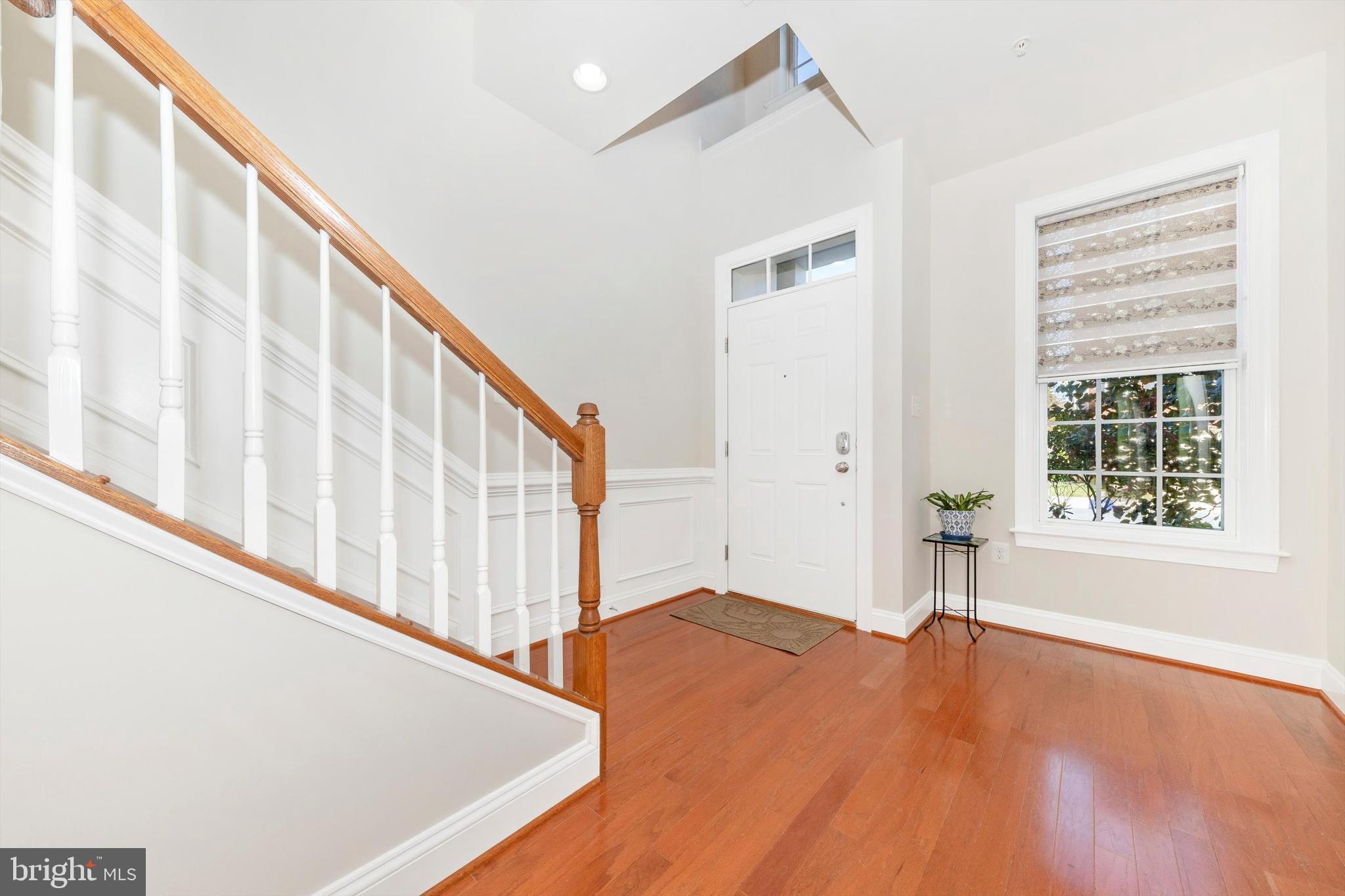 9655 Bothwell Lane Frederick, MD 21704 - Photo 8 of 58 a view of an entryway with wooden floor