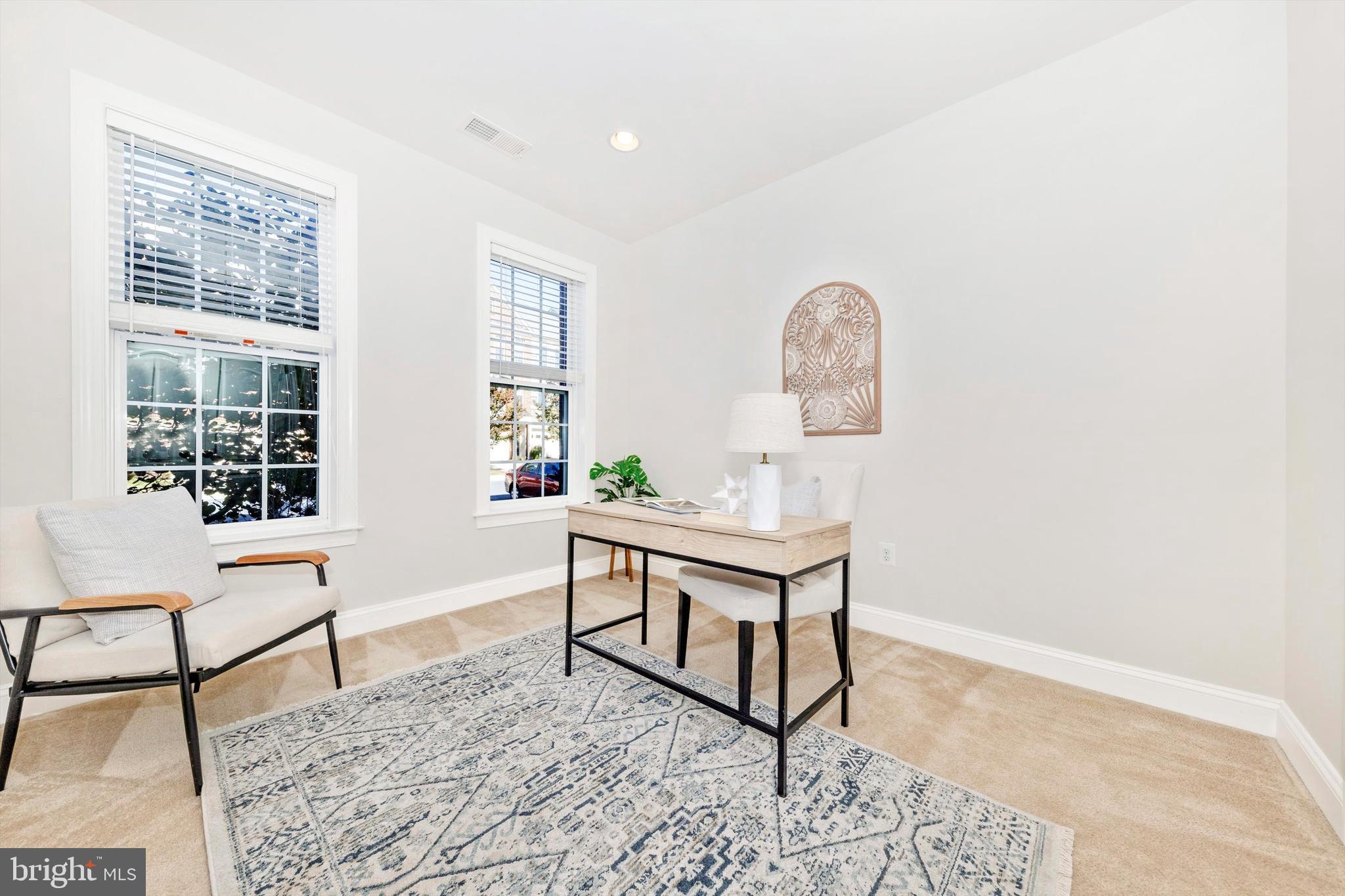 9655 Bothwell Lane Frederick, MD 21704 - Photo 10 of 58 a living room with furniture and a window