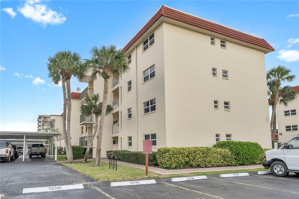 915 Beach Road, Unit 216 Sarasota, FL 34242 - Photo 1 of 30 a view of a street with a building in the background