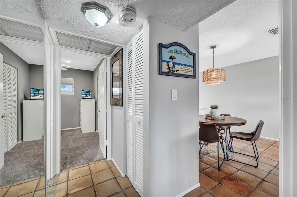 915 Beach Road, Unit 216 Sarasota, FL 34242 - Photo 10 of 30 a view of a hallway with seating area