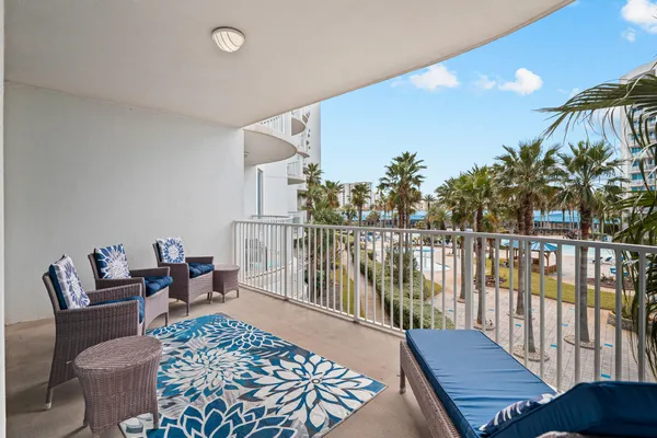 a view of swimming pool with outdoor seating and a couch