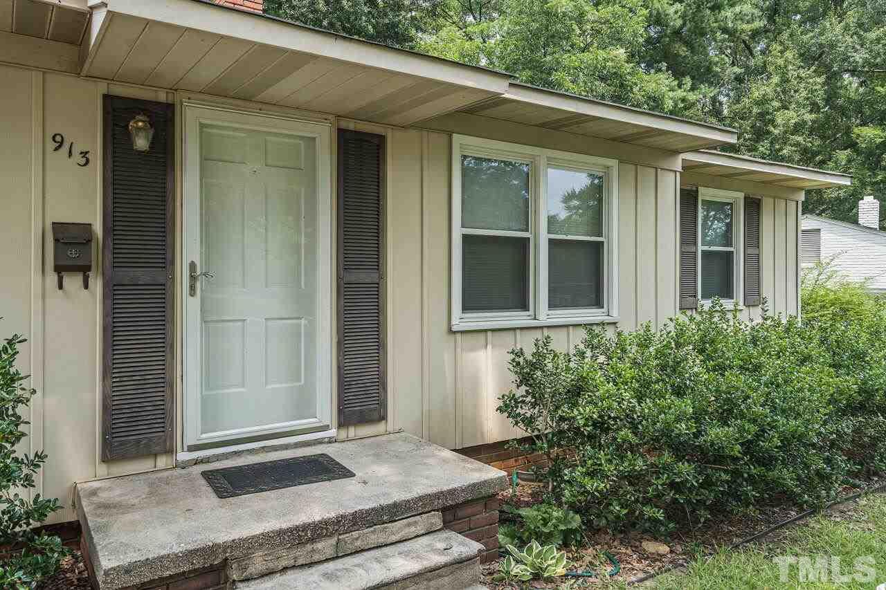 913 Culpepper Lane Raleigh, NC 27610 - Photo 2 of 23 a front view of a house with a yard