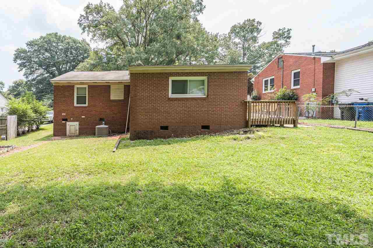 913 Culpepper Lane Raleigh, NC 27610 - Photo 22 of 23 a view of a house with a yard and sitting area