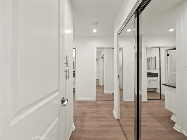 a bathroom with a shower and a glass door