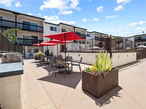 a dinning table and chairs in the patio