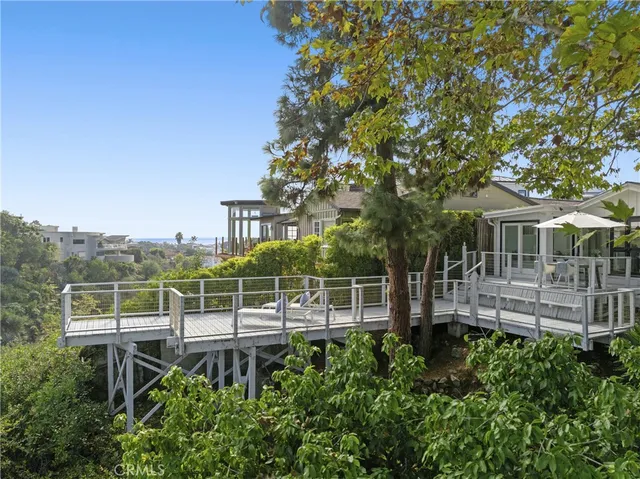 front view of a house with a garden