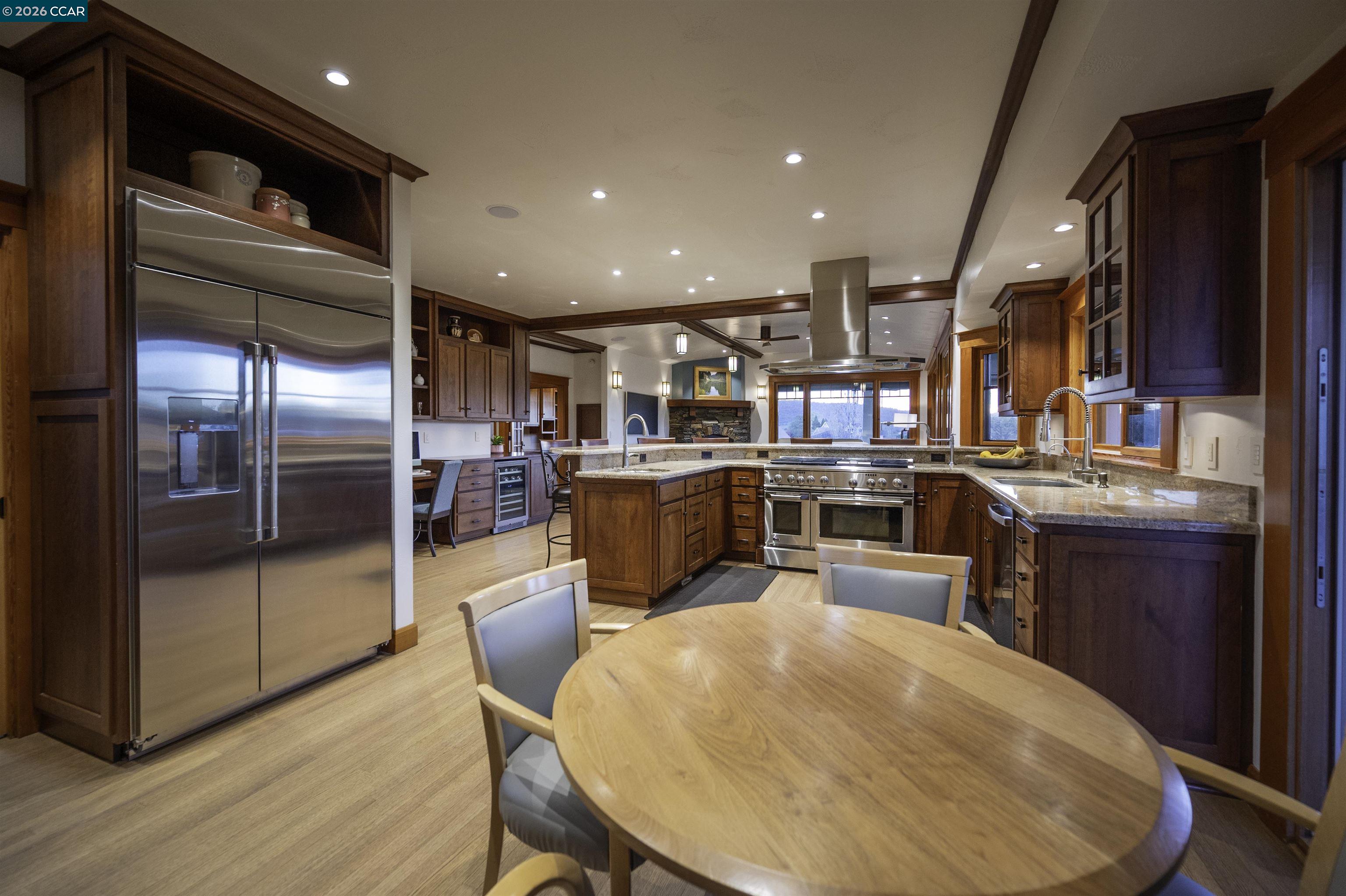 777 Grinding Rock Road Angels Camp, CA 95222 - Photo 15 of 60 GE Monogram appliances including 48" range/oven. New GE Cafe built-in refrigerator, pot filler, wine fridge, veggie sink.