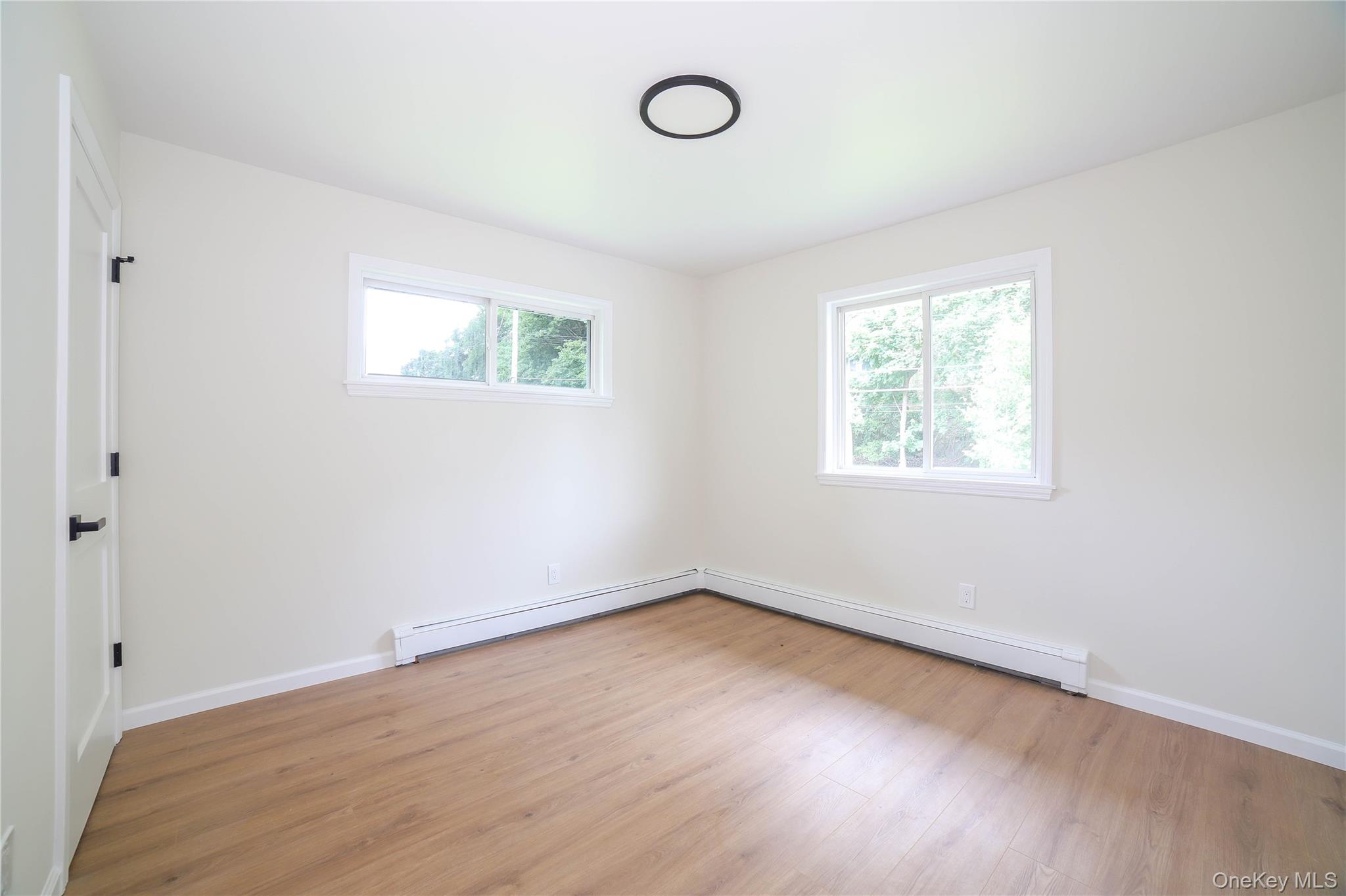 66 Putnam Road Cortlandt Manor, NY 10567 - Photo 15 of 37 an empty room with a window