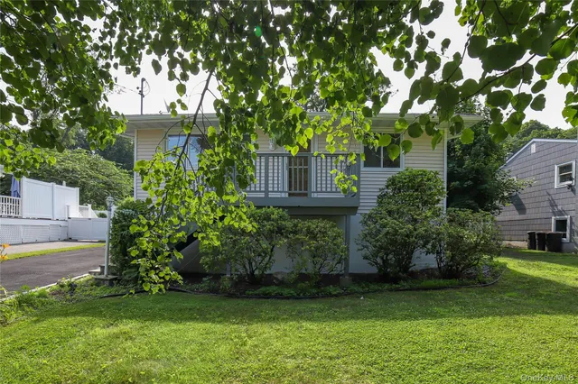 a view of a house with a garden