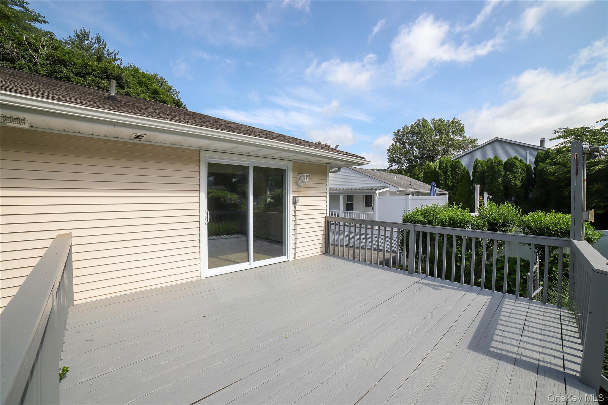 66 Putnam Road Cortlandt Manor, NY 10567 - Photo 5 of 37 a view of a house and deck