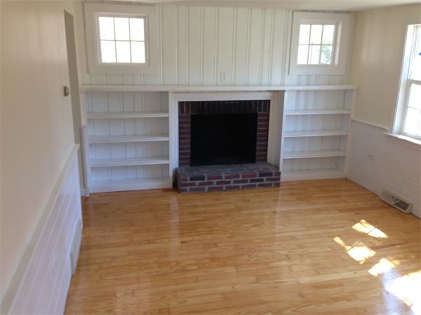 152 Telegraph Road Dennis, MA 02639 - Photo 6 of 11 a room with a fireplace