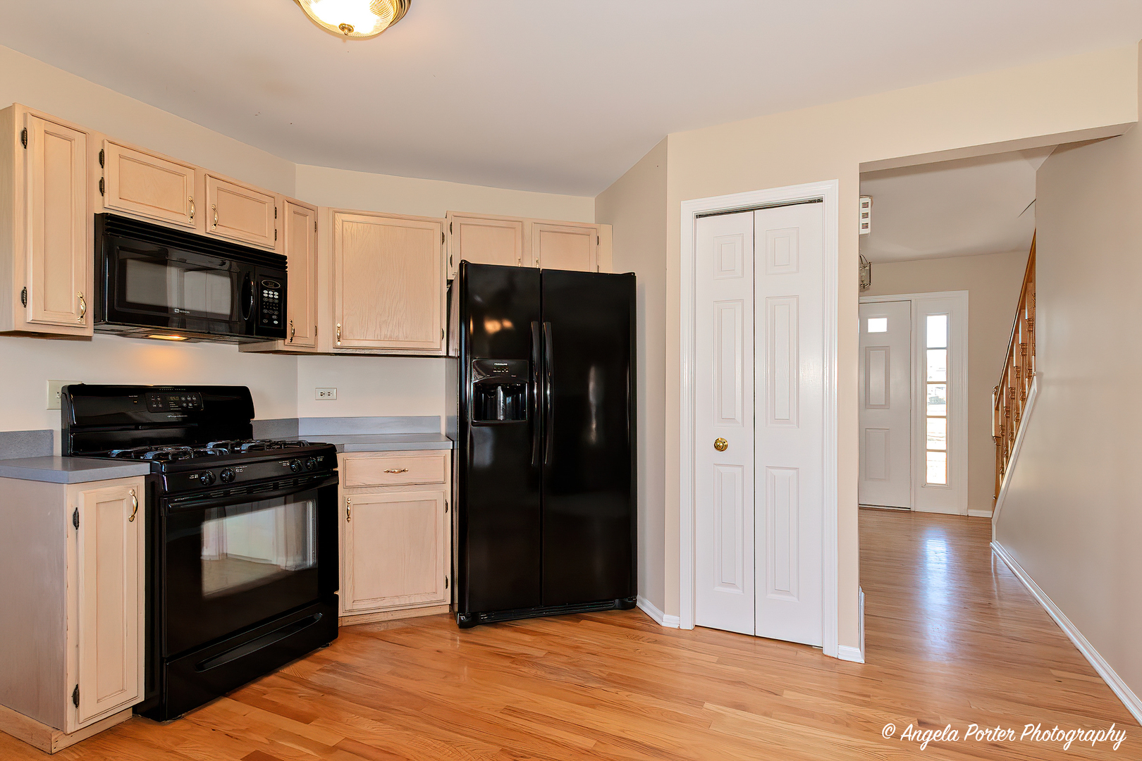 1305 Westport Ridge Crystal Lake, IL 60014 - Photo 16 of 31 a kitchen with stainless steel appliances granite countertop a refrigerator stove and microwave