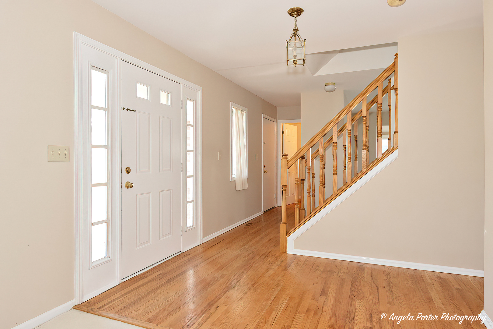 1305 Westport Ridge Crystal Lake, IL 60014 - Photo 2 of 31 a view of an entryway with wooden floor