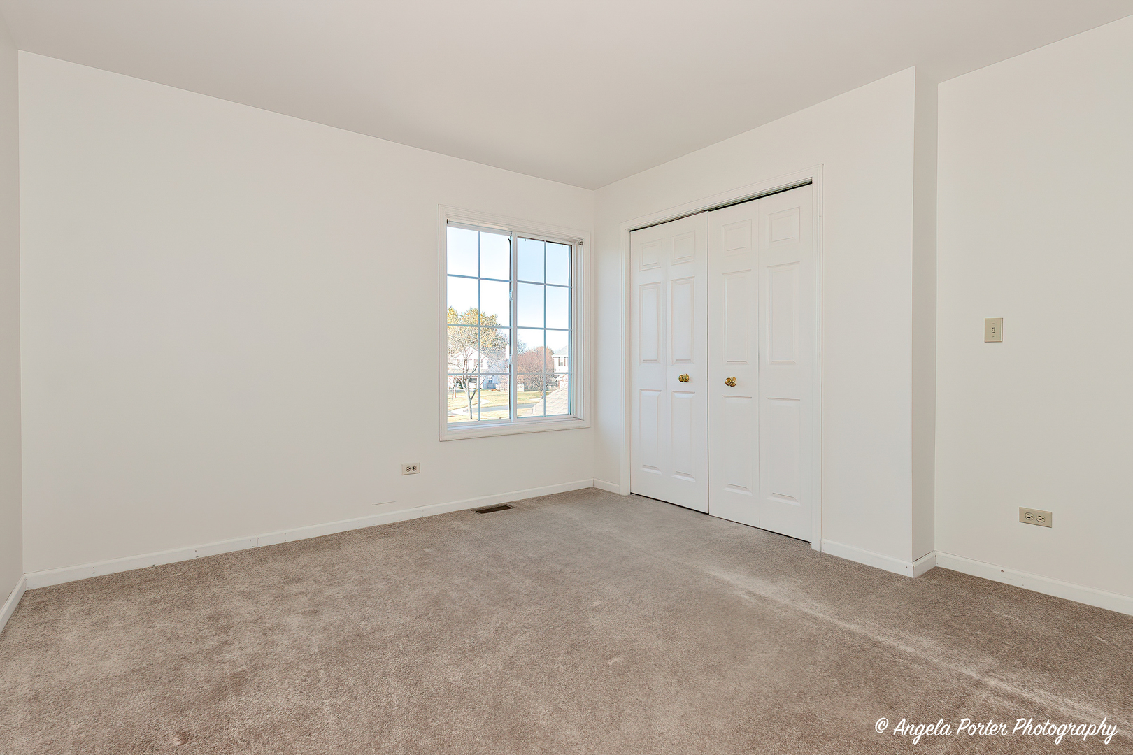 1305 Westport Ridge Crystal Lake, IL 60014 - Photo 23 of 31 an empty room with windows