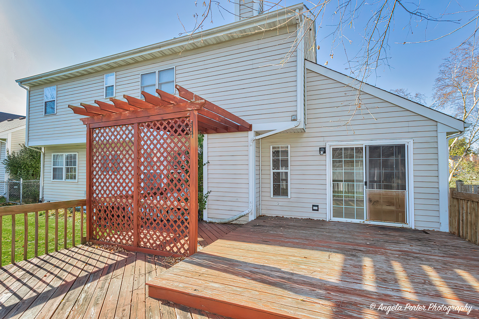 1305 Westport Ridge Crystal Lake, IL 60014 - Photo 25 of 31 a view of a house with wooden fence