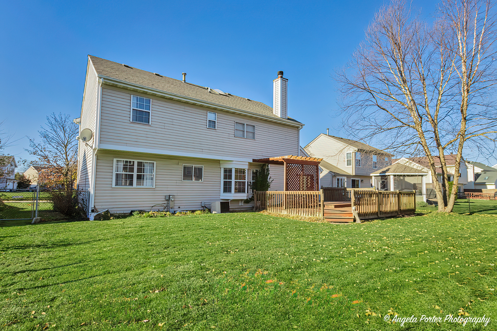 1305 Westport Ridge Crystal Lake, IL 60014 - Photo 26 of 31 a view of a house with a yard