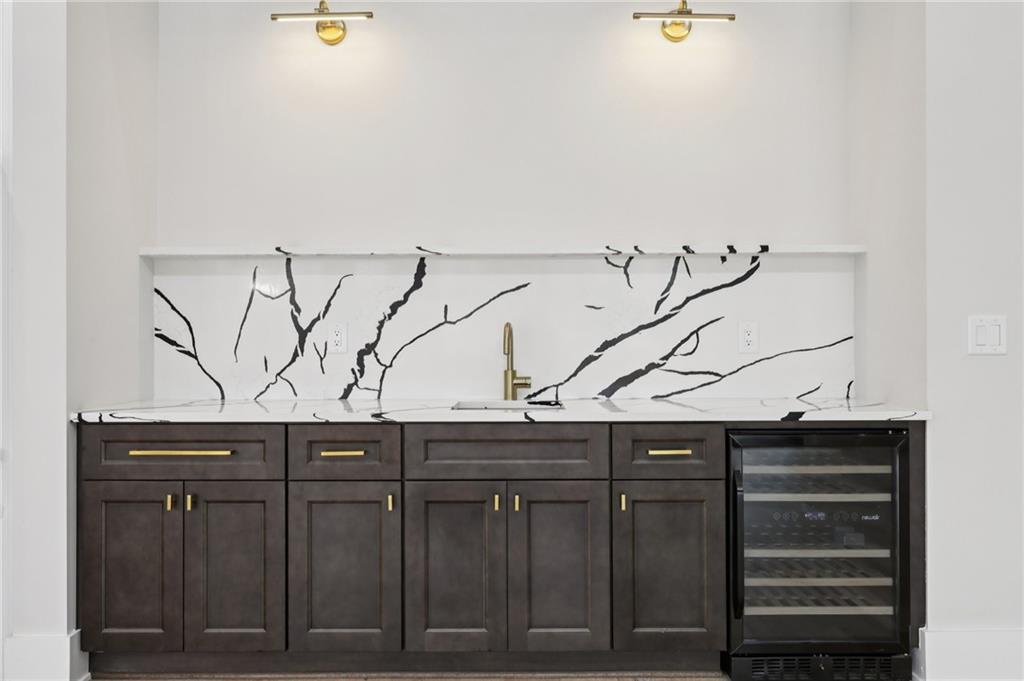 24 Rocking Wood Drive Auburn, GA 30011 - Photo 14 of 66 a close view of a sink and cabinets