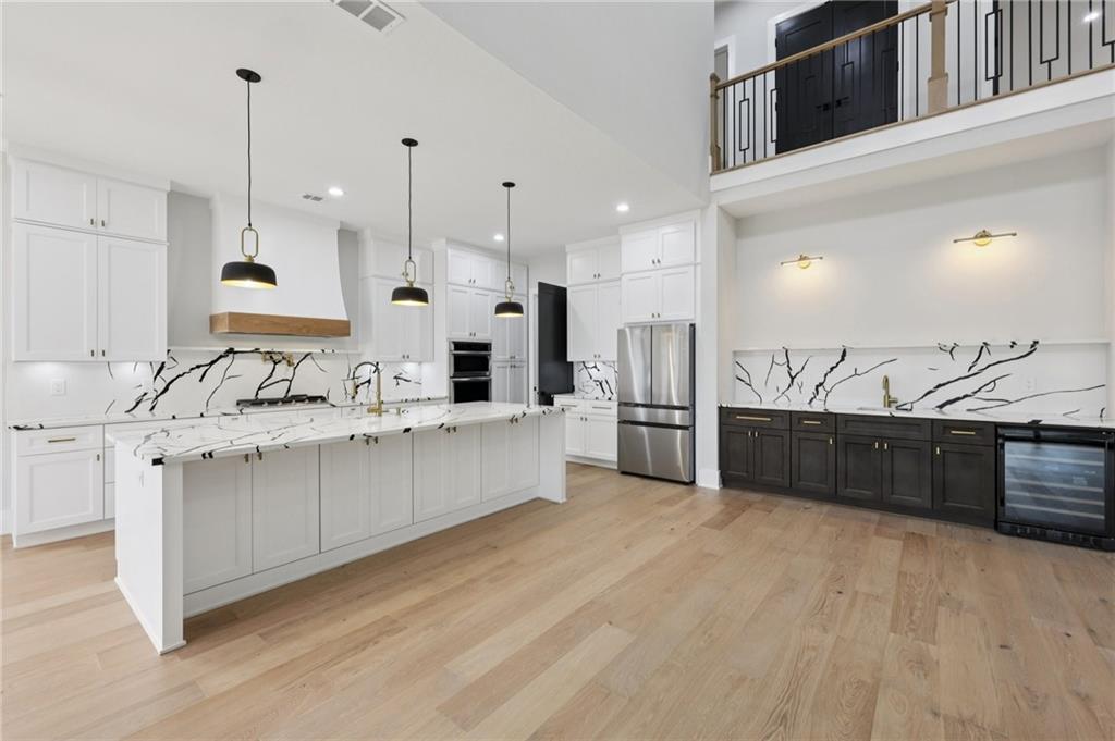 24 Rocking Wood Drive Auburn, GA 30011 - Photo 20 of 66 a large bathroom with a large tub and sink