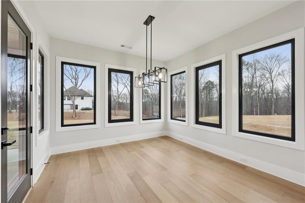 24 Rocking Wood Drive Auburn, GA 30011 - Photo 28 of 66 a view of an empty room with glass door and glass door