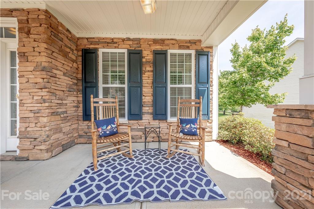 364 Lorraine Road Fort Mill, SC 29708 - Photo 2 of 39 a balcony with furniture and large windows
