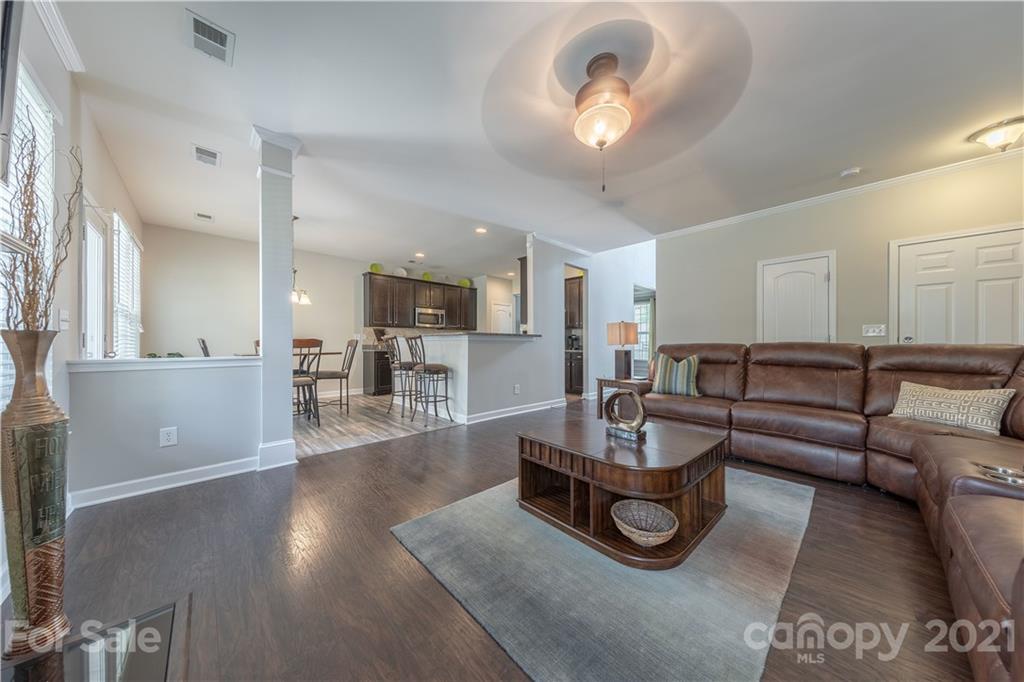 364 Lorraine Road Fort Mill, SC 29708 - Photo 11 of 39 a living room with furniture and a wooden floor