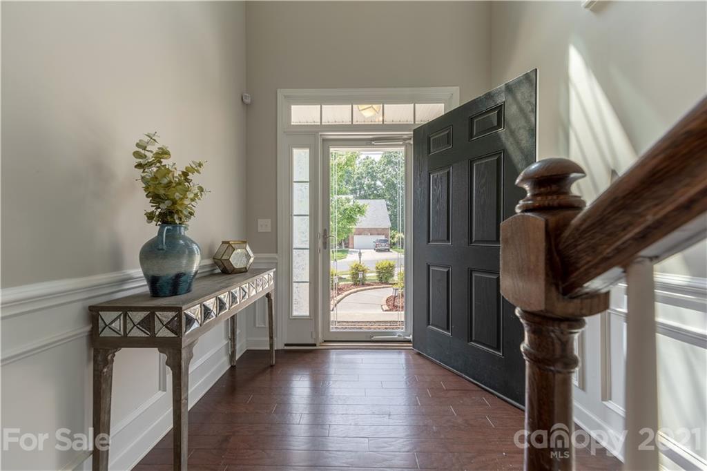 364 Lorraine Road Fort Mill, SC 29708 - Photo 3 of 39 a view of a hallway with wooden floor and staircase