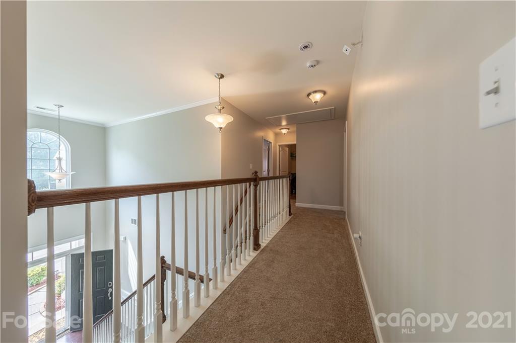 364 Lorraine Road Fort Mill, SC 29708 - Photo 22 of 39 a view of a hallway with wooden floor