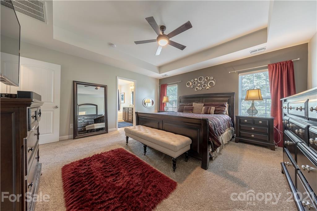 364 Lorraine Road Fort Mill, SC 29708 - Photo 24 of 39 a bedroom with furniture and a fireplace
