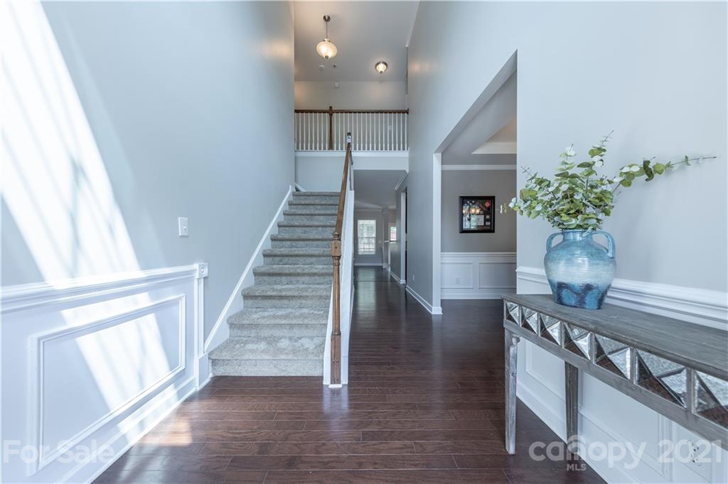 364 Lorraine Road Fort Mill, SC 29708 - Photo 4 of 39 a view of entryway and hall with wooden floor