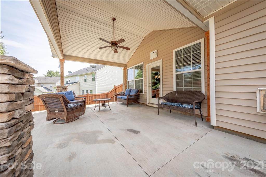 364 Lorraine Road Fort Mill, SC 29708 - Photo 34 of 39 a outdoor space with patio furniture and a fireplace