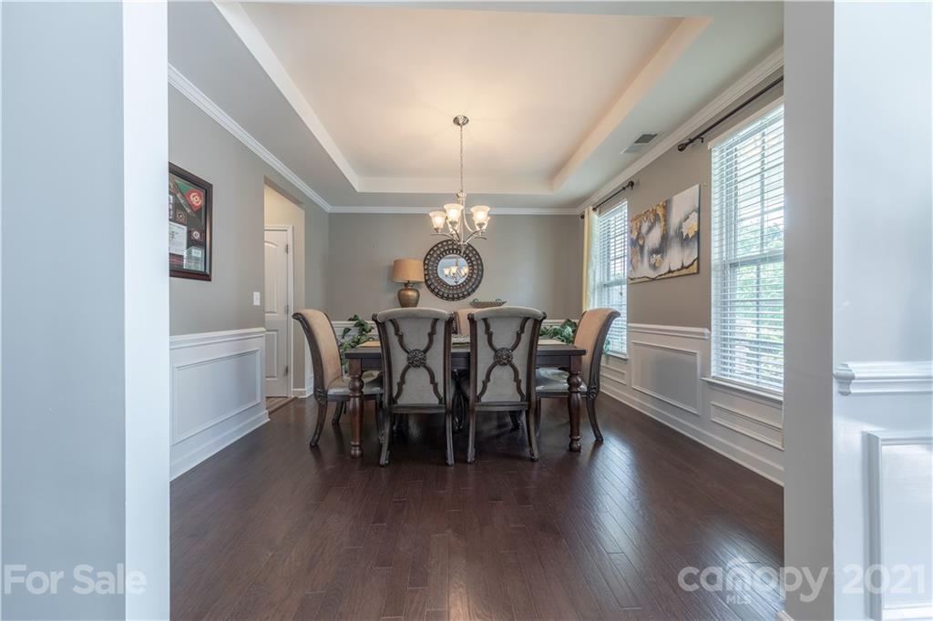 364 Lorraine Road Fort Mill, SC 29708 - Photo 6 of 39 a view of a dining room with furniture window and wooden floor