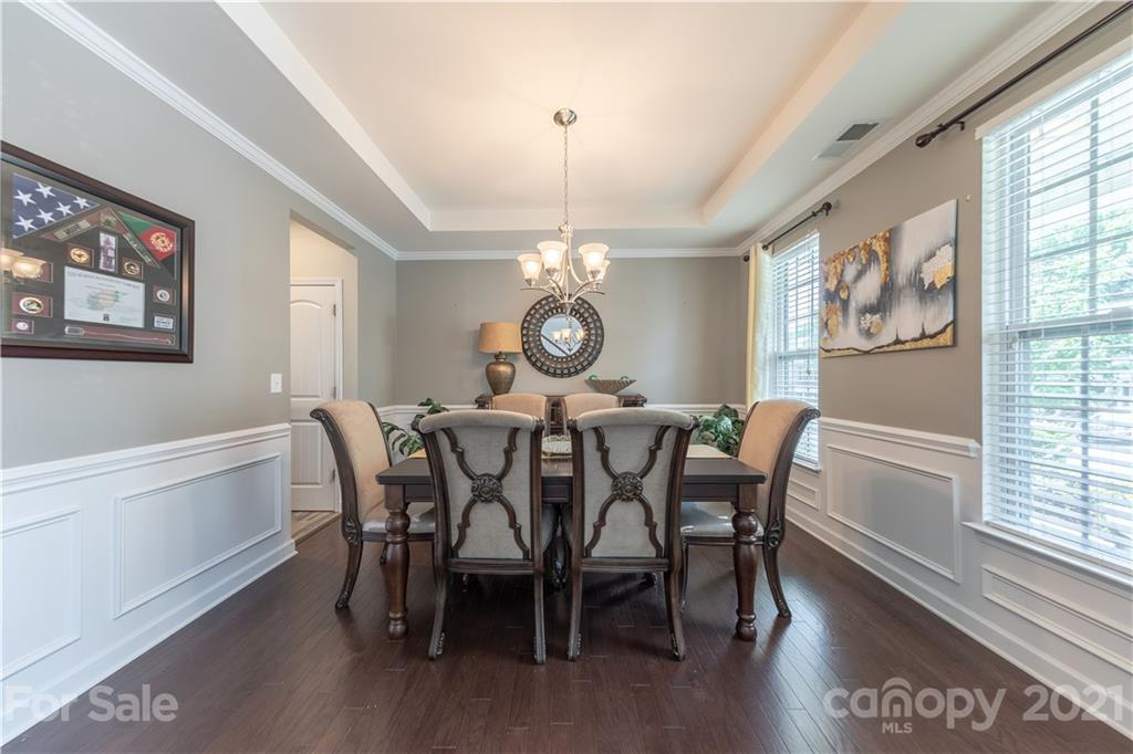 364 Lorraine Road Fort Mill, SC 29708 - Photo 7 of 39 a view of a dining room with furniture window and wooden floor