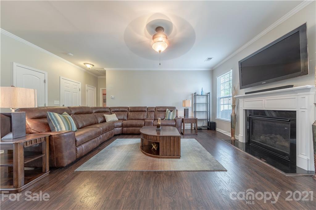 364 Lorraine Road Fort Mill, SC 29708 - Photo 10 of 39 a living room with furniture and a fireplace