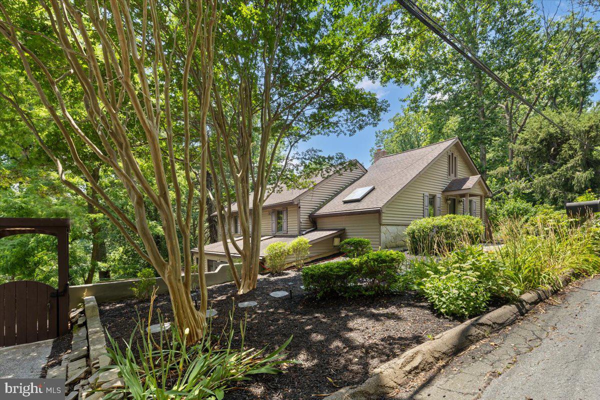 425 Mountain Road Crownsville, MD 21032 - Photo 3 of 69 front view of a house with a tree