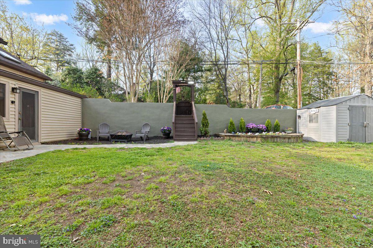 425 Mountain Road Crownsville, MD 21032 - Photo 50 of 69 a view of a barn with big yard potted plants and large tree
