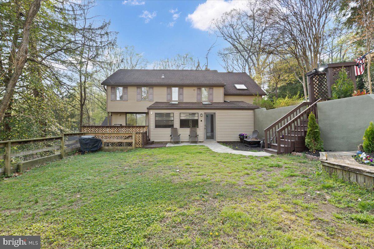 425 Mountain Road Crownsville, MD 21032 - Photo 10 of 69 a view of a house with a backyard