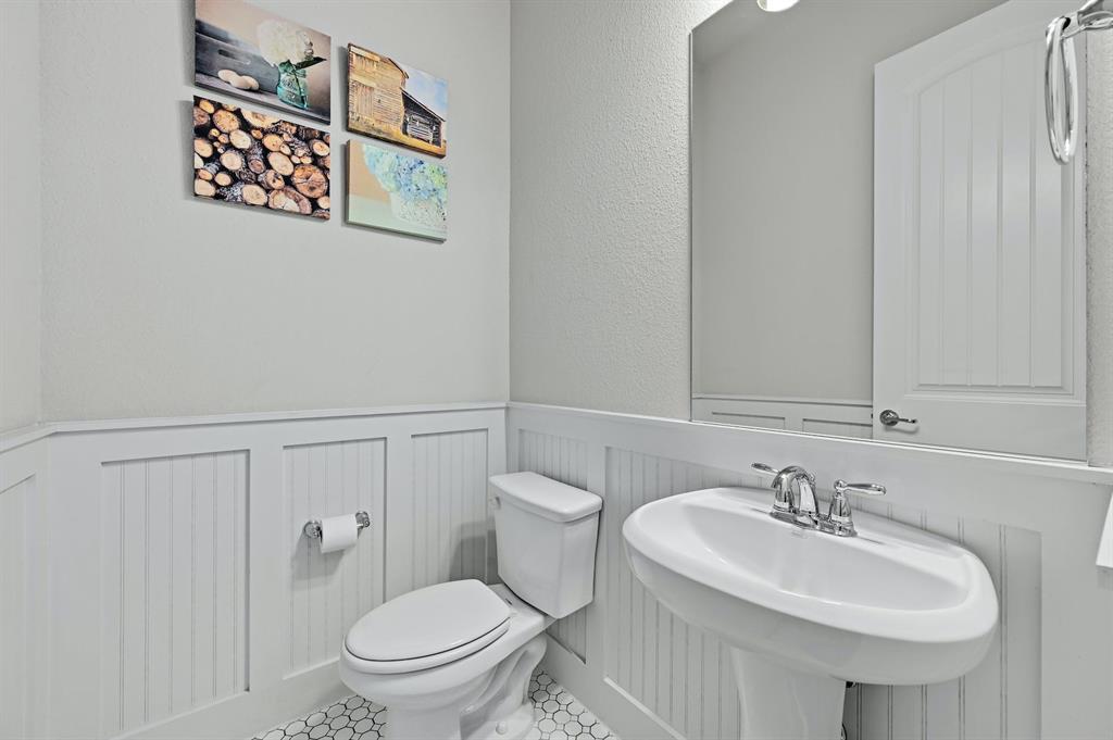 629 Germander Road Leander, TX 78641 - Photo 22 of 38 a bathroom with a sink and a toilet