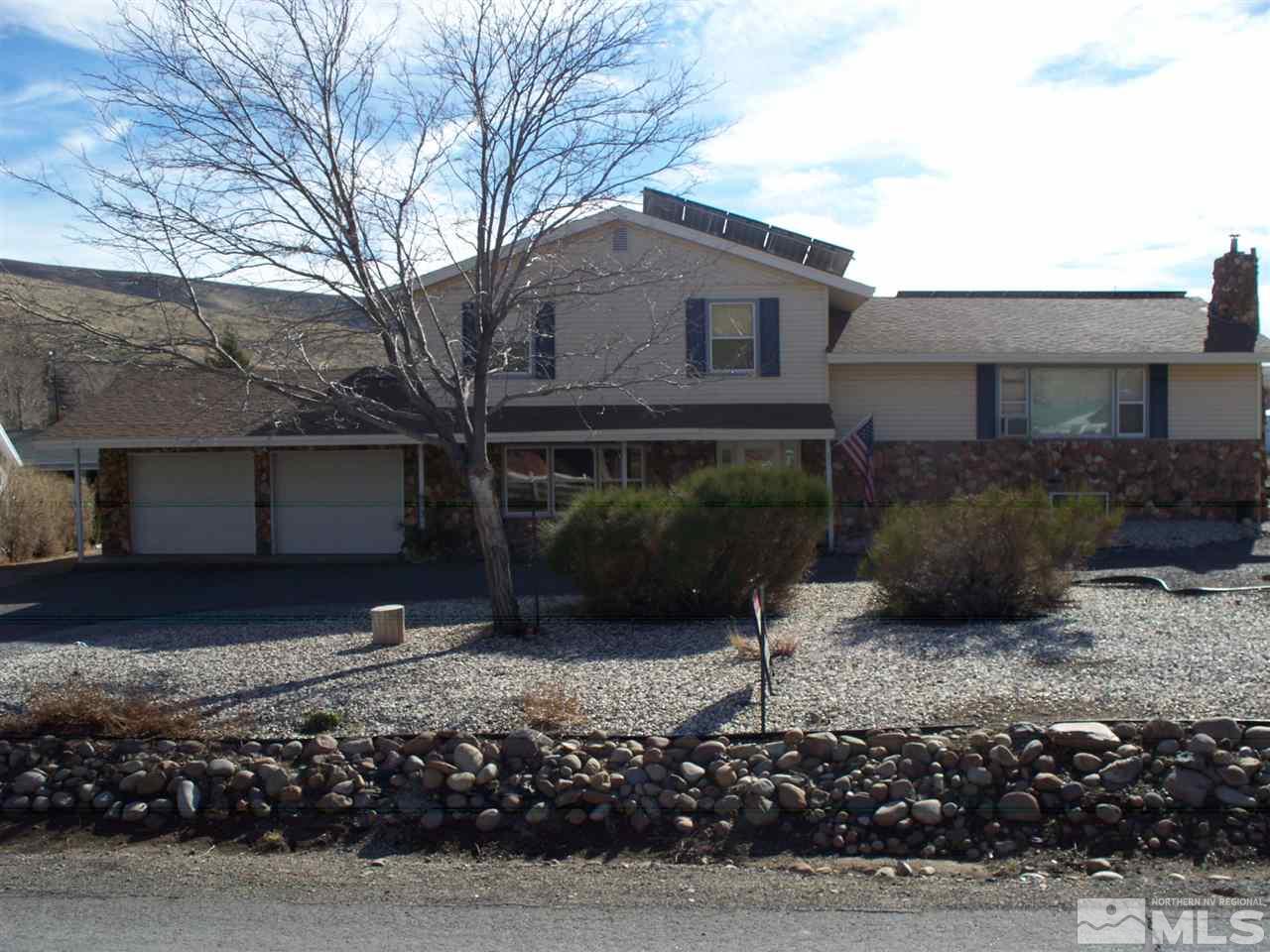 180 Surrey Drive Reno, NV 89521 - Photo 1 of 1 a view of a house with a yard