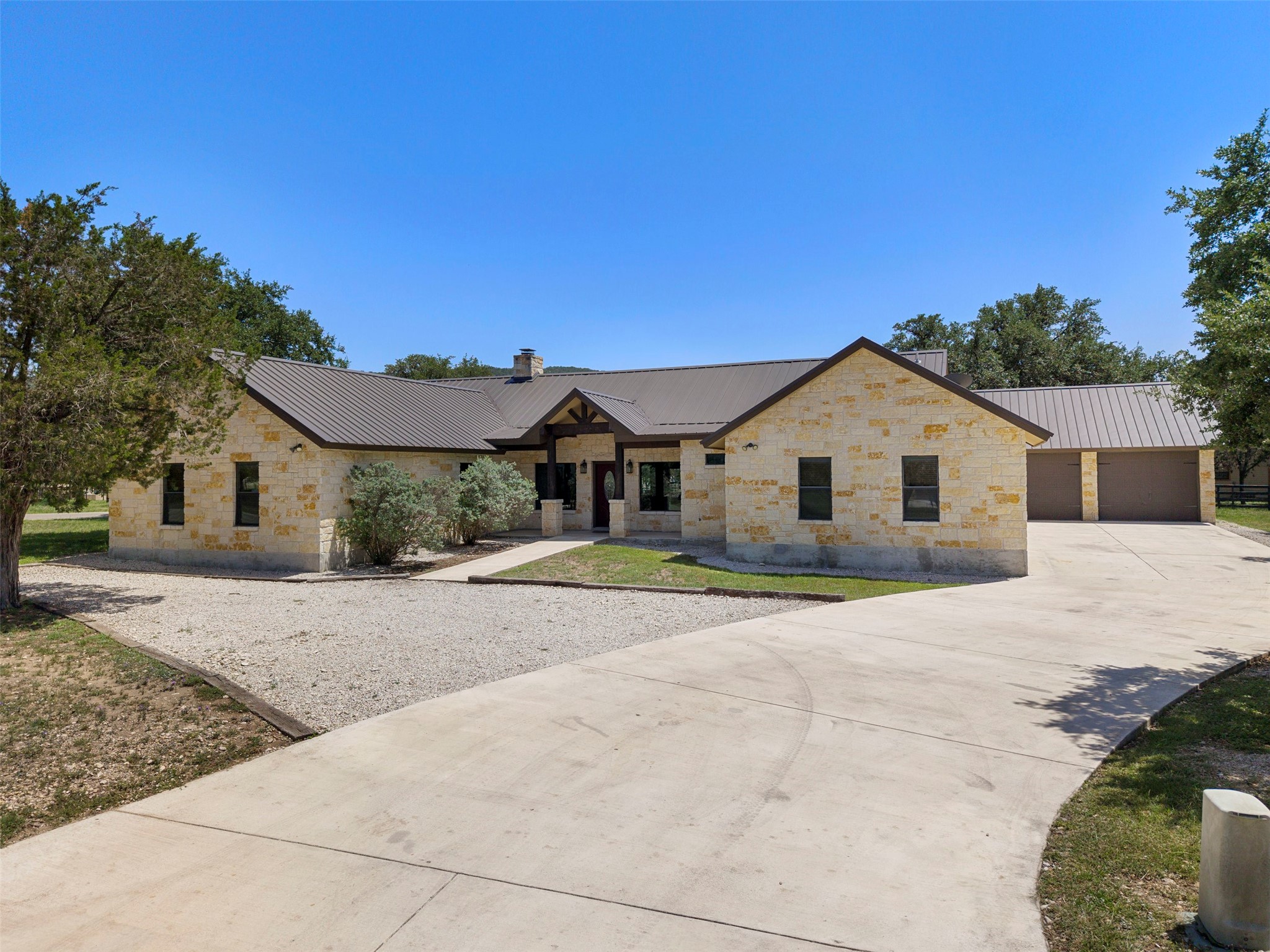 43 Heartstone Road Concan, TX 78838 - Photo 4 of 50 a view of house and outdoor space